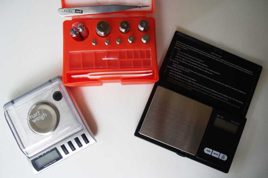 Key equipment required: two sets of electronic scales, with calibration/check weights behind.